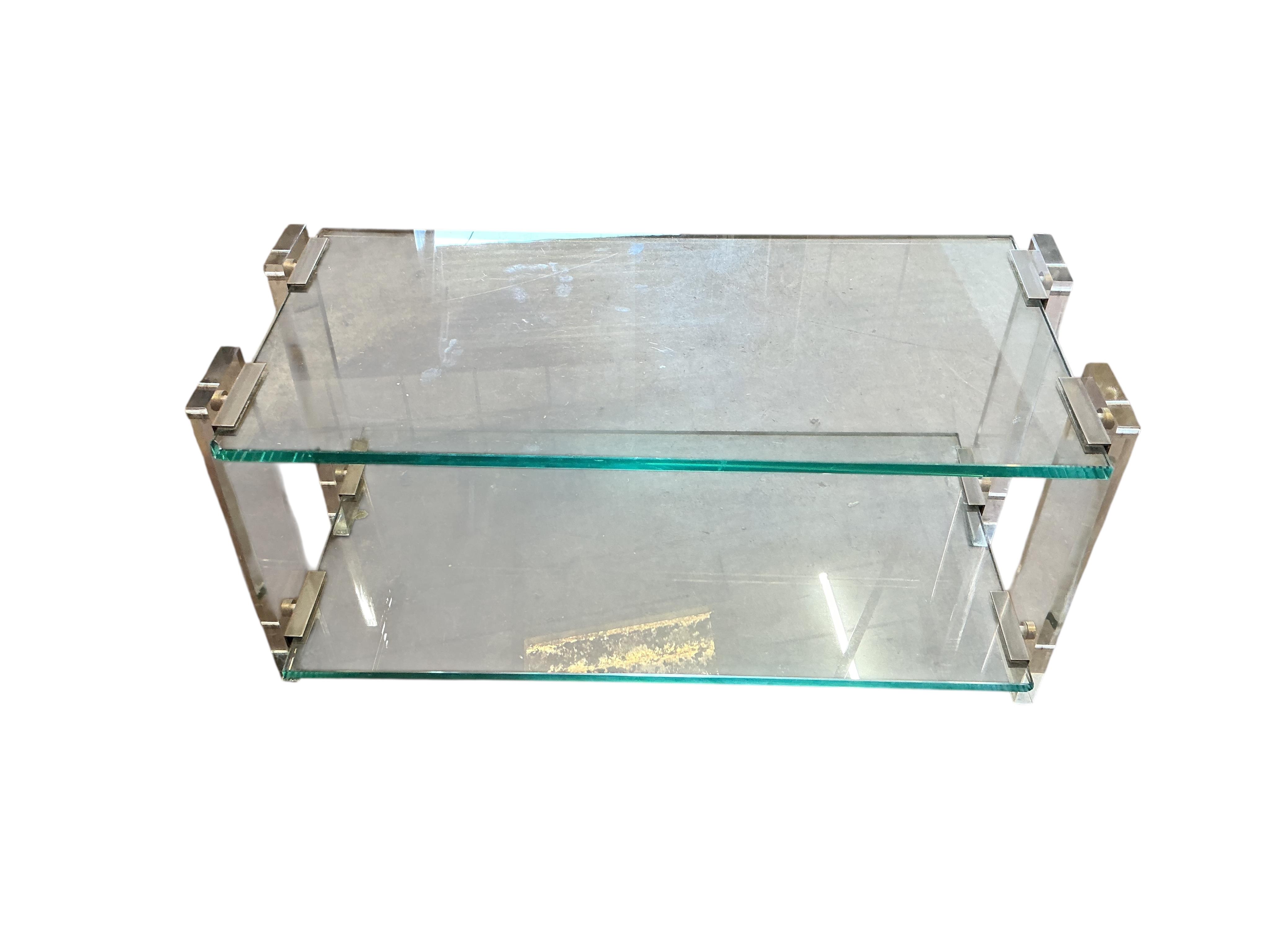 A modernist acrylic and glass two tier coffee table, width 85cm, depth 40cm, height 41cm